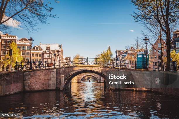 Amsterdam Cityscape With Canal And Bridges In Netherlands Stock Photo - Download Image Now