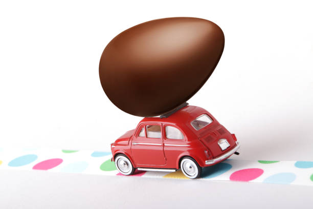 istock Egg symbol of Easter, comes by car 929765400