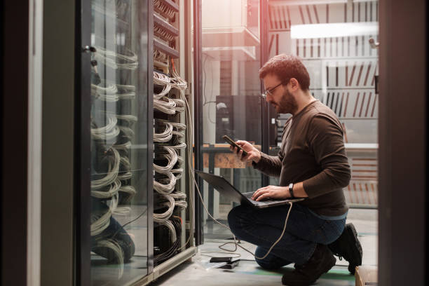 server rooms engeneer at work telecommunications equipment stock pictures, royalty-free photos & images