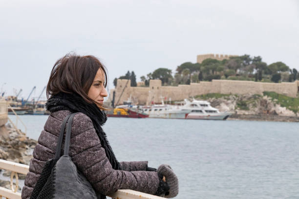 istock Beautiful woman looking away 929772628