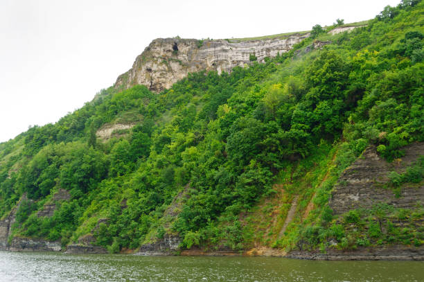 istock rocks on the slope above the water 929780380