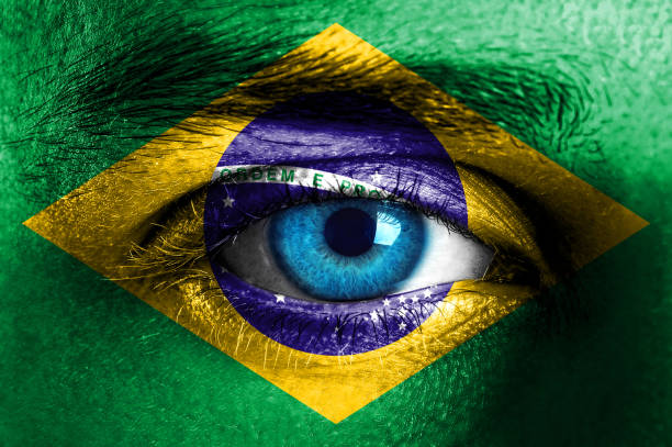 istock Human face painted with flag of Brazil 929780846
