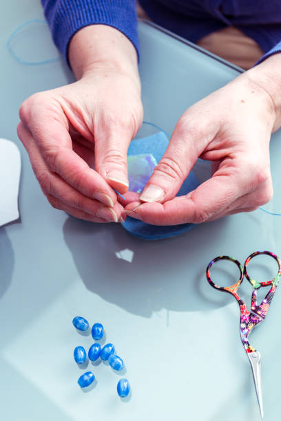 istock Woman Sewing Heart Shape Magic Wand 929781188