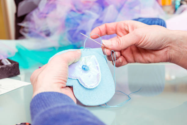 Close Up Woman Hands Sewing Princess Magic Wand