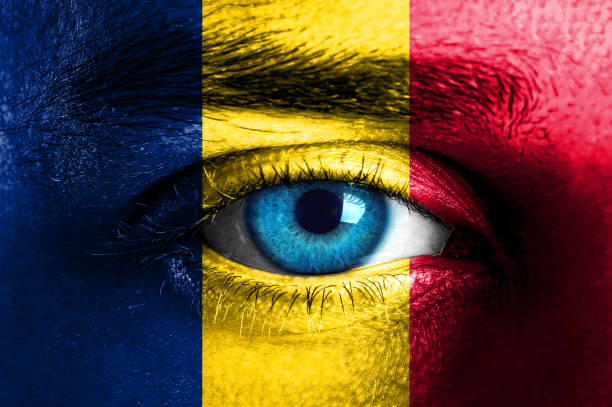 istock Human face painted with flag of Chad 929786086