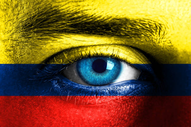 istock Human face painted with flag of Colombia 929786494