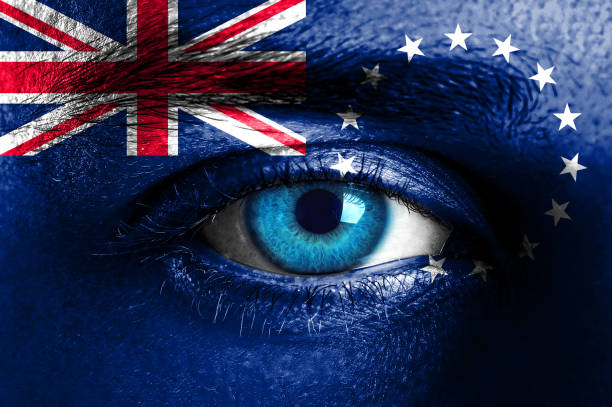 istock Human face painted with flag of Cook Islands 929787082