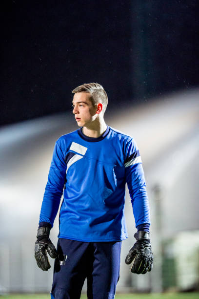 Portrait of a Goalkeeper Practicing on Soccer Training Portrait of a Goalkeeper Practicing on Soccer Training. teen goalie stock pictures, royalty-free photos & images