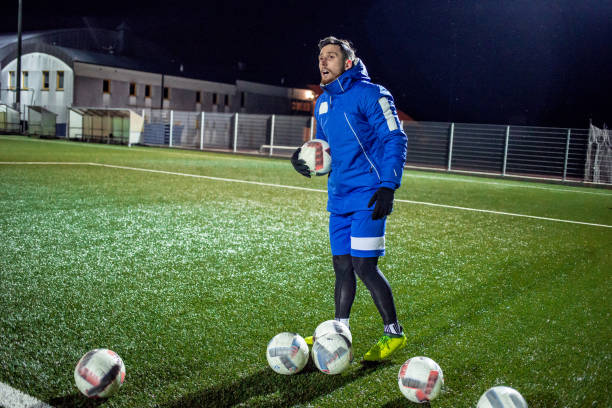 istock Goalkeepers Coach on Soccer Training 929790402