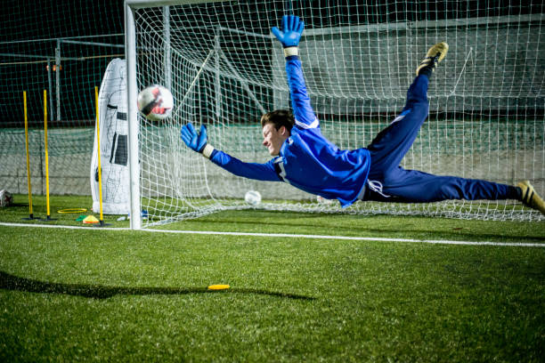 Goalkeeper Catching the Ball in Mid Air