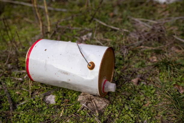 istock Discarded drinks can lies on the grass underwater 929797510