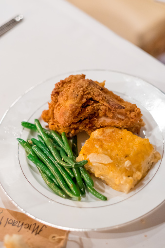 Southern fried chicken plated at this beautiful wedding reception at a California winery in Autumn or Fall.