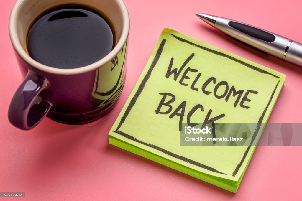 welcome back on a sticky note welcome back - handwriting on a sticky note with a cup of coffee Greeting Stock Photo