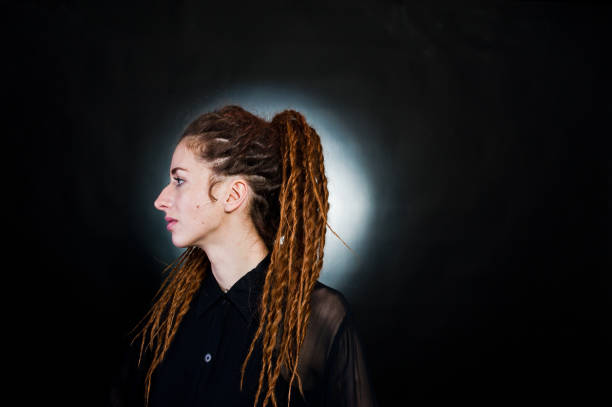 istock Studio shoot of girl with dreads. 929803868