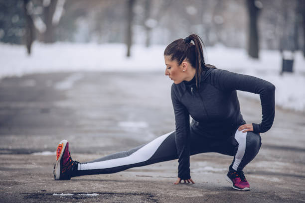 istock Woman exercising outdoors 929806674