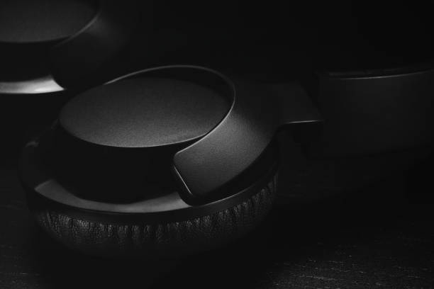 Hi-Fi headphones on a laptop in the studio.