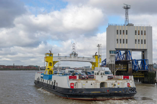 A View from on one of the Ferry's with Vehicles on the deck\n