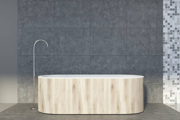 istock Concrete and tiled bathroom, wooden tub 929831482