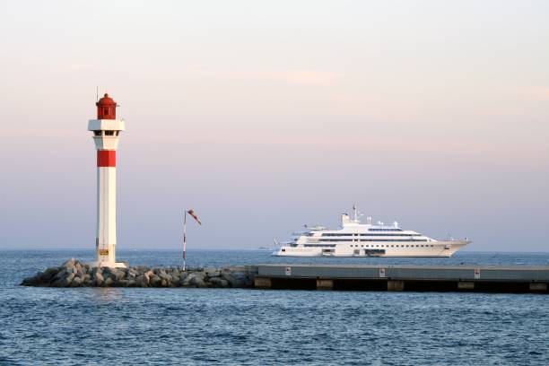 istock Super yacht anchored near beacon 92983719