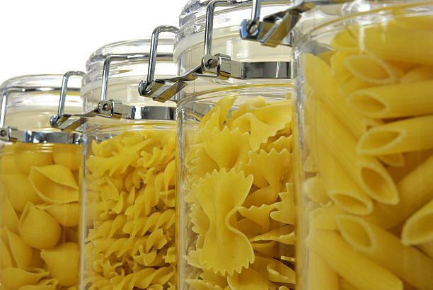 istock Various shapes of pasta in jars 92984013