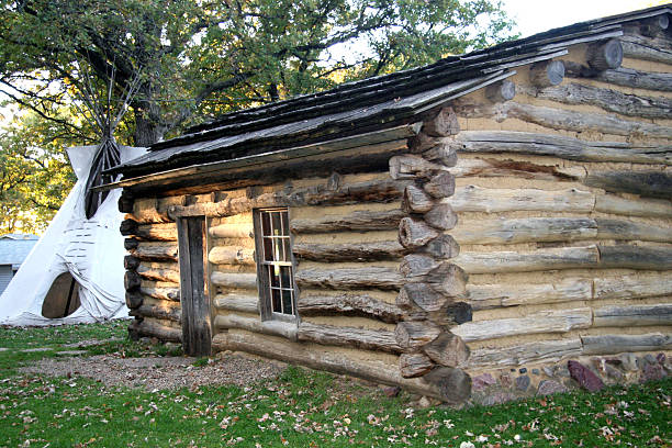istock Historic Abbey Garner Cabin with Indian Teepee at Okoboji 92984427