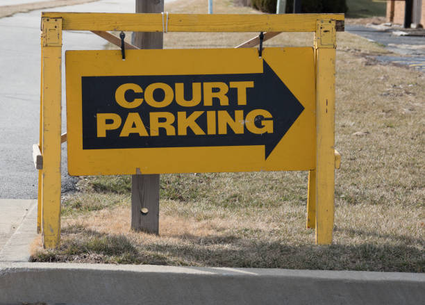 istock Sign directing to court parking 929848852