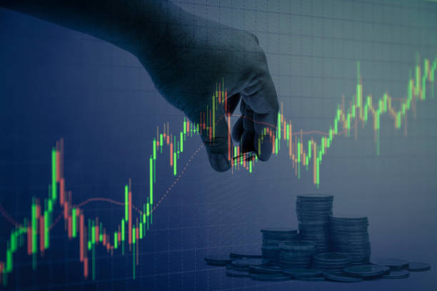 istock coin stacks with hand candlestick graph background , Business and financial concept 929861026