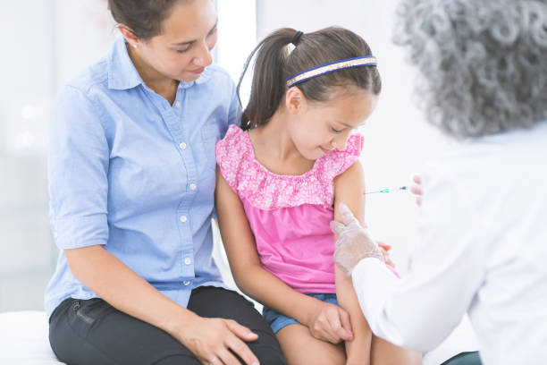 istock Young girl getting an immunization shot 929861958