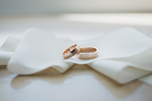 Designer wedding rings on table