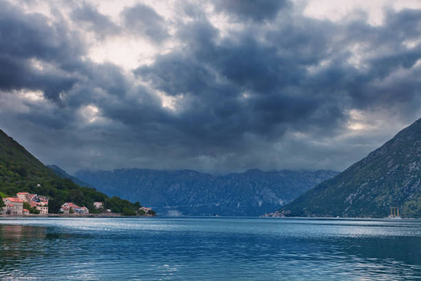 istock sea and mountains in gloomy weather 929877130