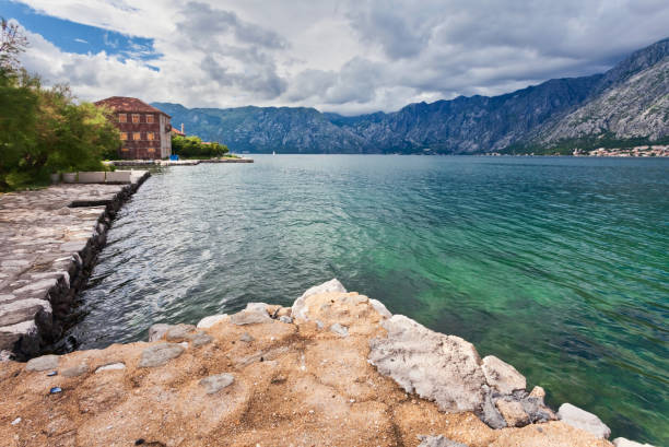 istock sea and mountains in gloomy weather 929877166