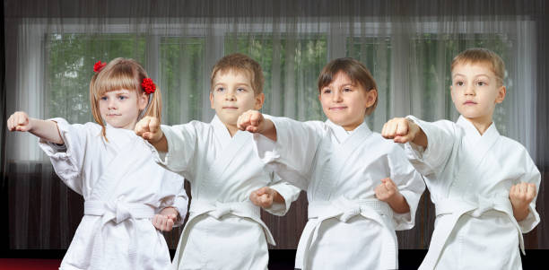 istock Four athlete beat punch arm 929883320