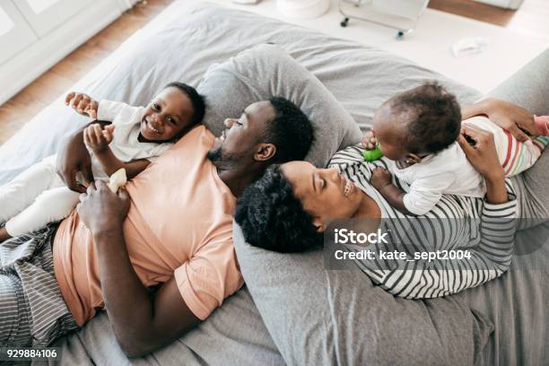 The Family Homebuying Handbook Stock Photo - Download Image Now - Family, Baby - Human Age, African-American Ethnicity