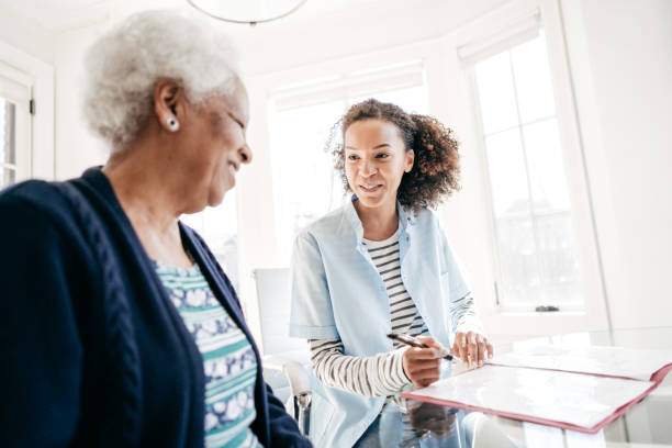 istock Caregiver consultation at home 929884168