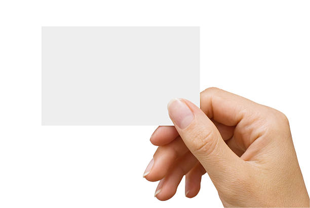 vacío tarjeta de visita en una mano femenina - template business business card holding fotografías e imágenes de stock