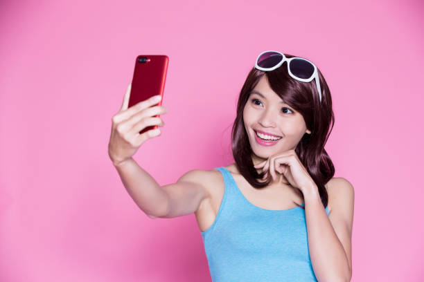 istock woman selfie happily 929901060