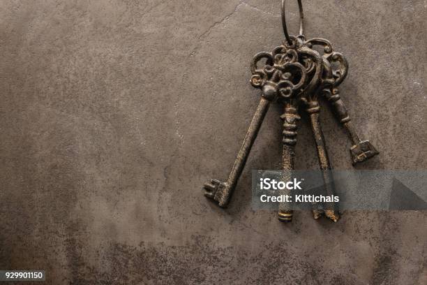 Antique Keys On Old Steel Metal Texture Background Stock Photo - Download Image Now - Key, Old, Door