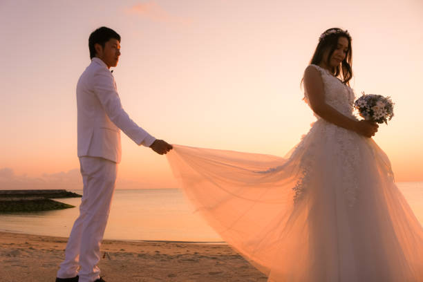 istock Wedding at the sunset beach 929904126