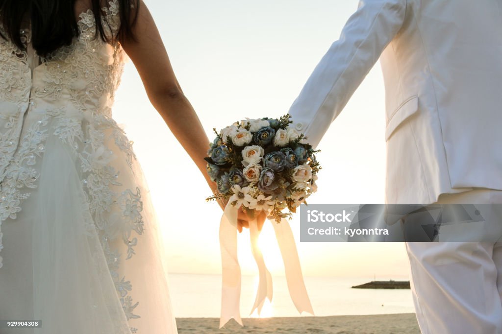 Bouquet en la playa - Foto de stock de Boda libre de derechos