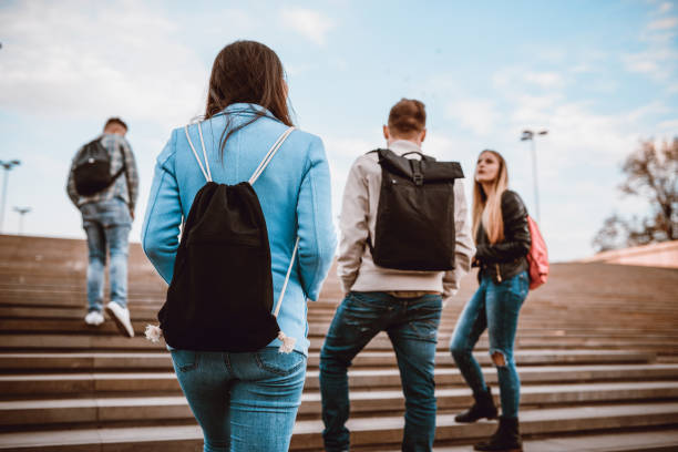 istock Group of Students with Backpacks Walking to School 929905330