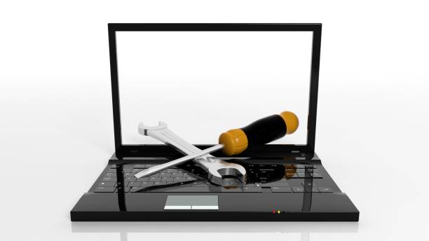 istock Screwdriver and wrench on laptop 929914748