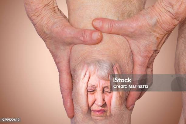 Senior Woman Holding The Knee With Pain Stock Photo - Download Image Now - Pain, Marijuana Joint, Knee