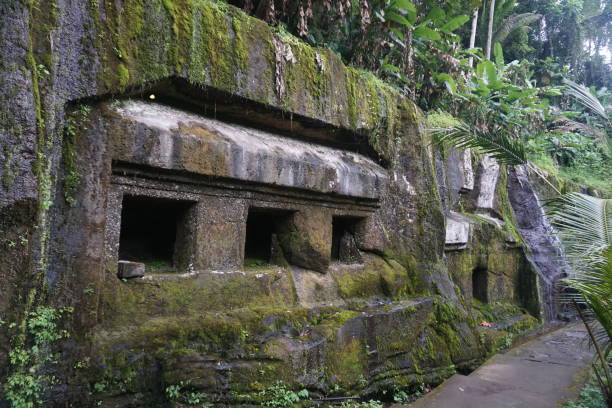 istock Balinese temple carved in stone with plants 929928744