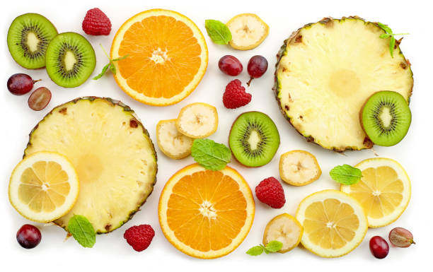 istock composition of various fresh fruit slices and berries 929930498