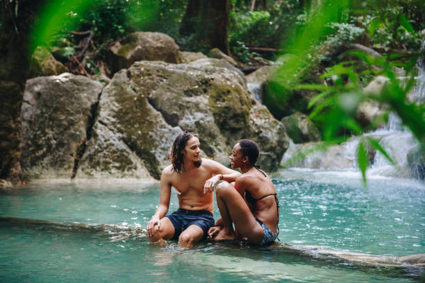 istock Couple enjoying the waterfall 929930946