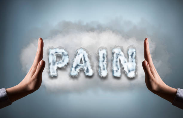istock STOP PAIN with hand sign on blue background (Click for more) 929933580