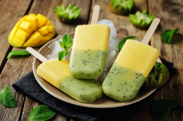 istock Kiwi mango ice cream with fruits and ices 929934024