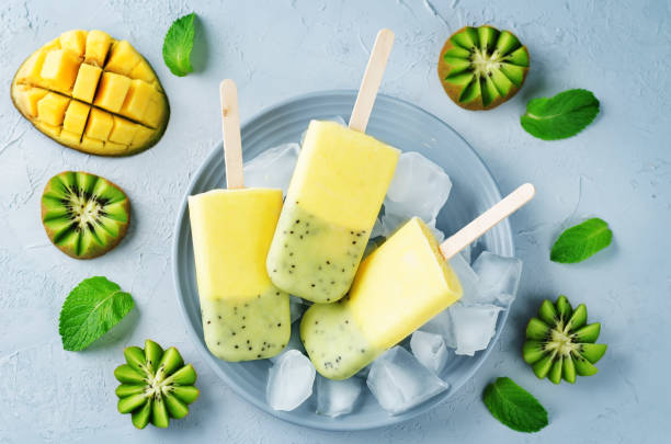 istock Kiwi mango ice cream with fruits and ices 929934028