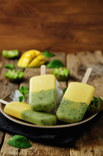 istock Kiwi mango ice cream with fruits and ices 929934030