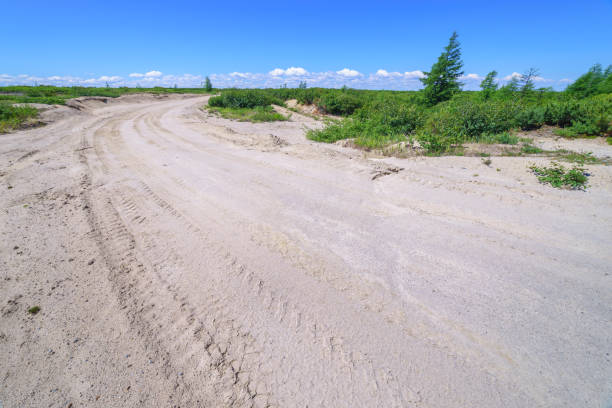 istock Sandy road, Sakhalin Island, Russia. 929934116